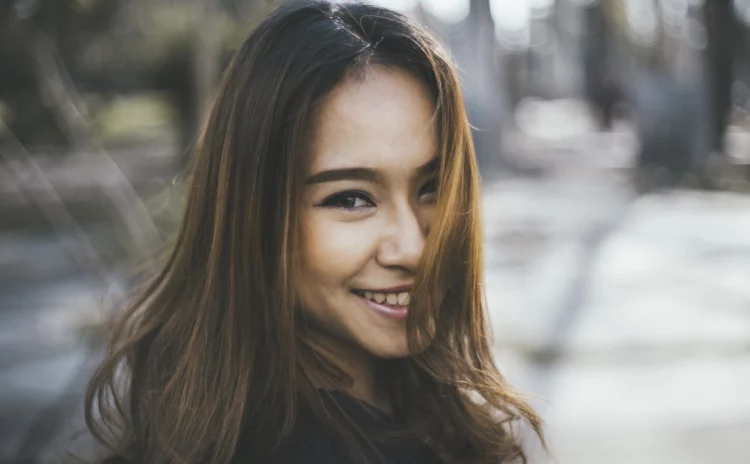 Asian woman smiling and happy