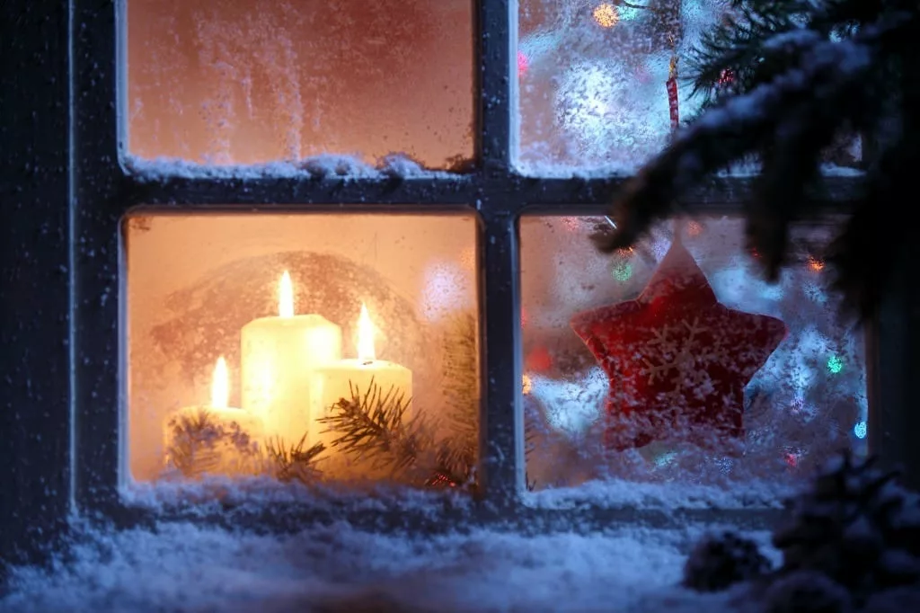 Frosted window with Christmas decoration.