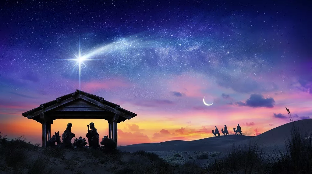 Nativity of Jesus scene with comet at sunrise.