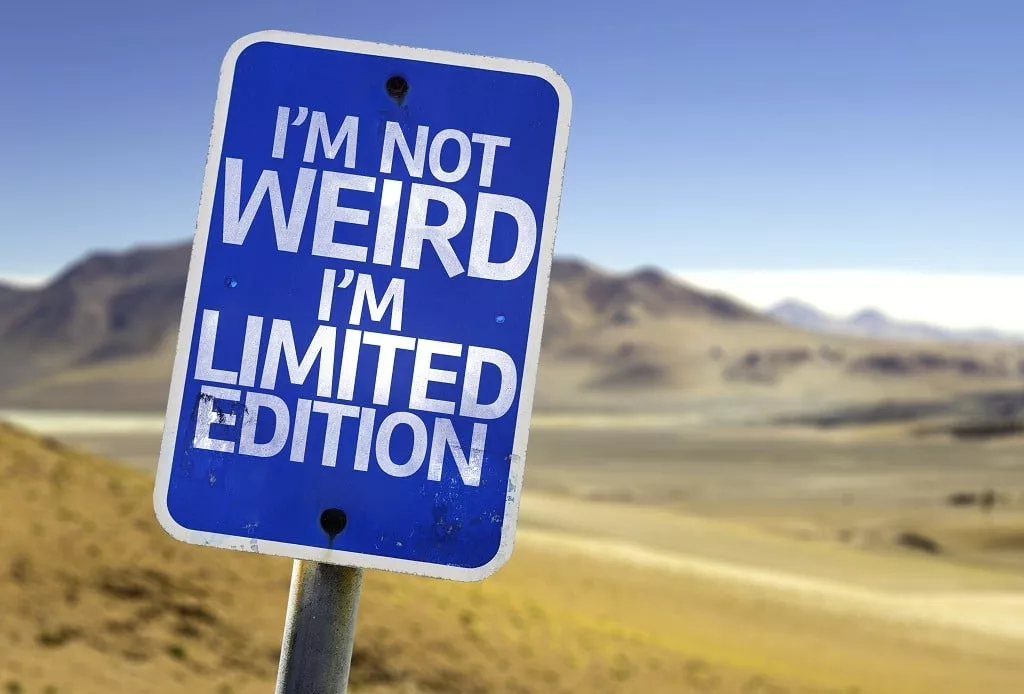 I'm Not Weird Im Limited Edition signpost on the street in a desert.