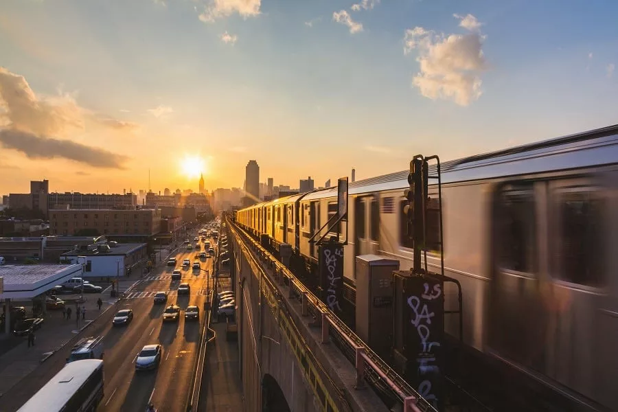 Subway train in New York at sunset.
