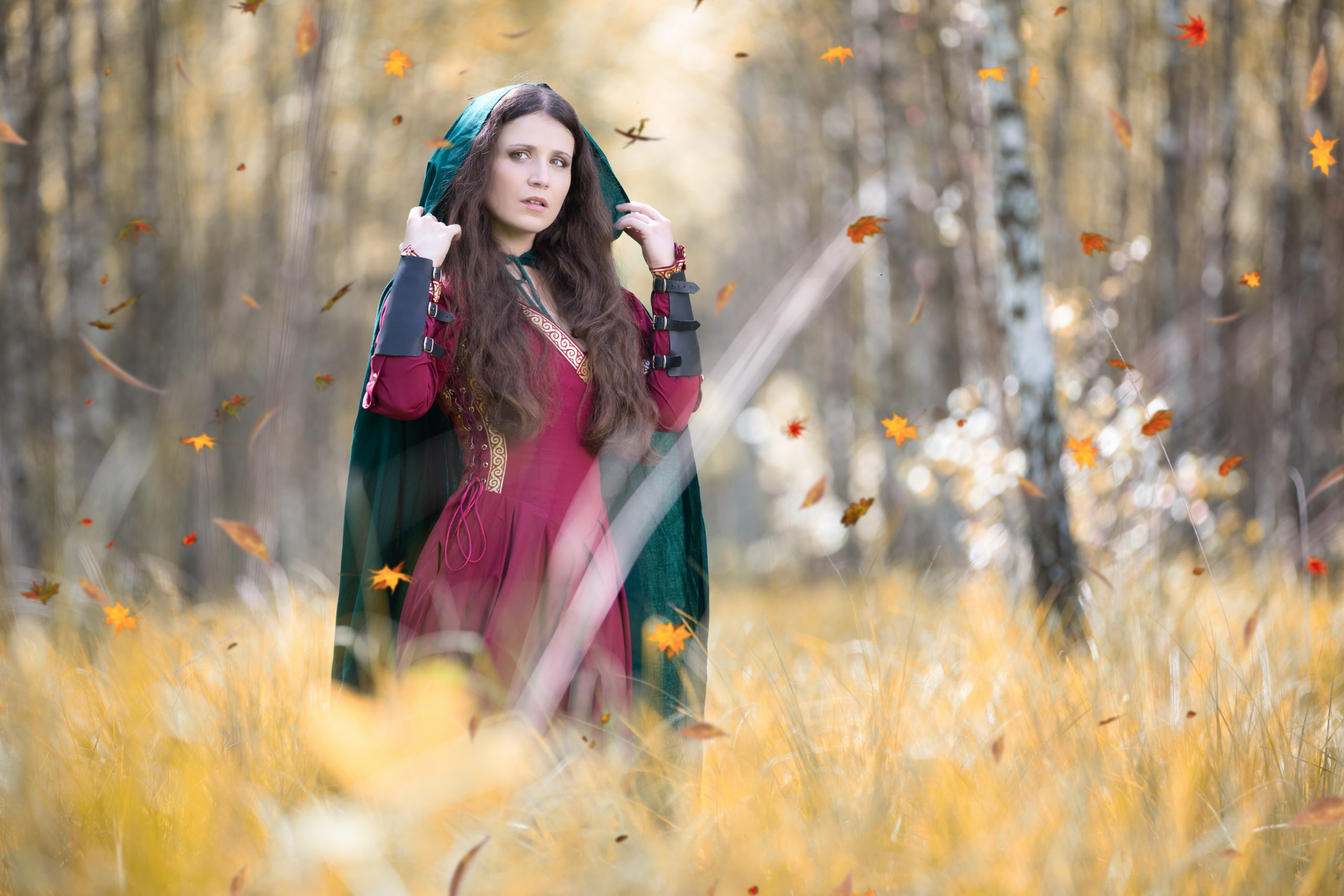 Medieval woman in the autumn forest