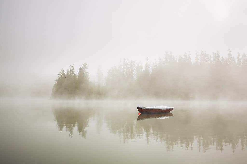 Boat in mysterious fog.
