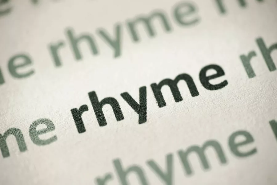Word rhyme printed on paper macro.