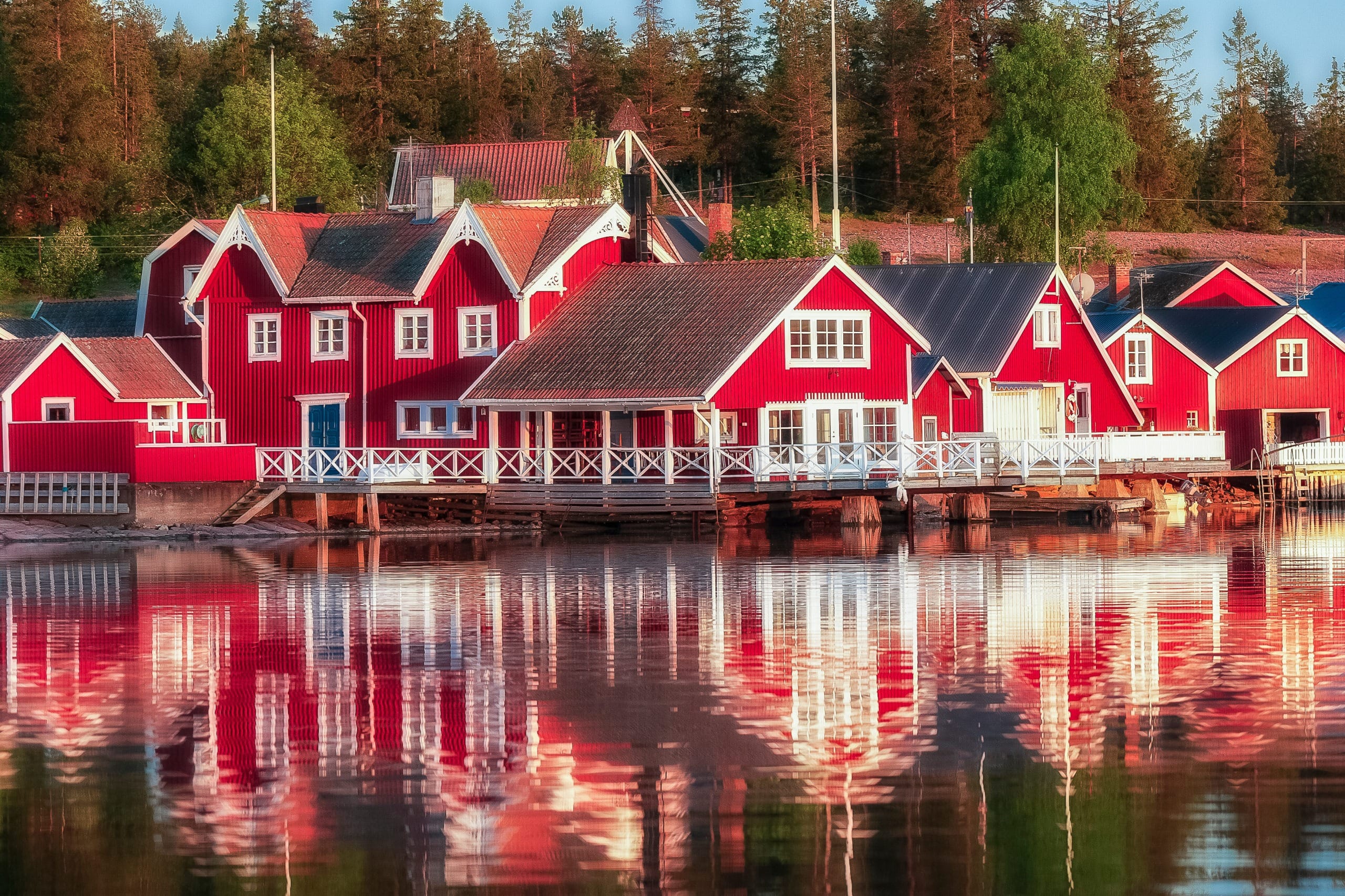 Red houses at sunset in the fishing village.