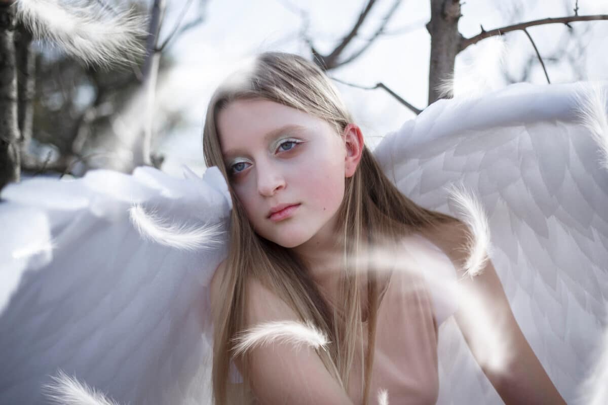 Beautiful girl white angel with angel wings