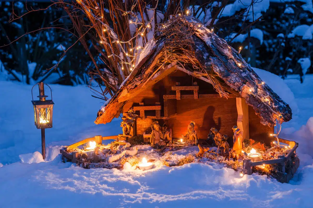 a Christmas manger in the snow