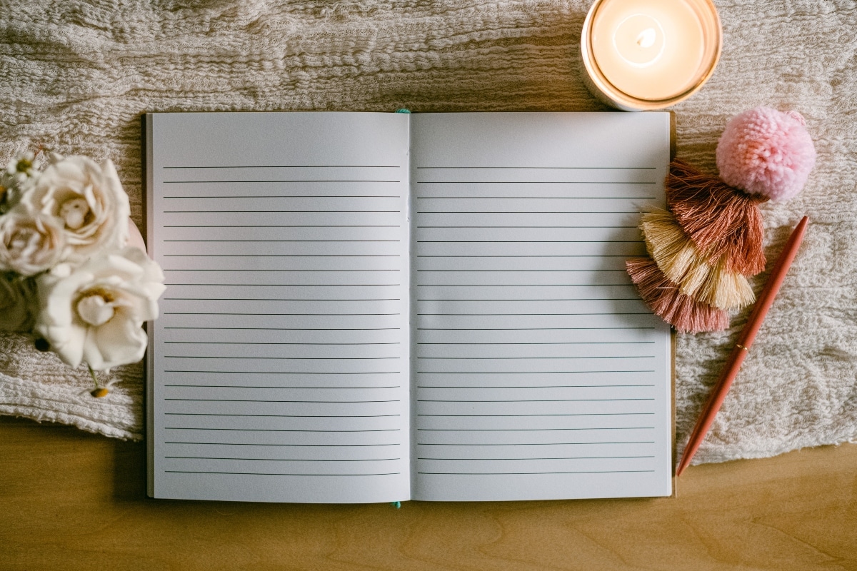 blank notebook with candle