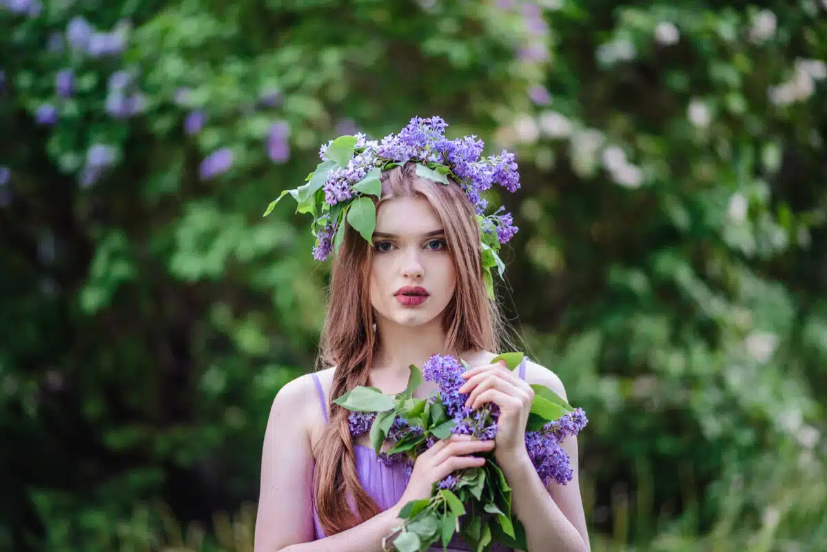 The girl with the wreath on his head in lilac