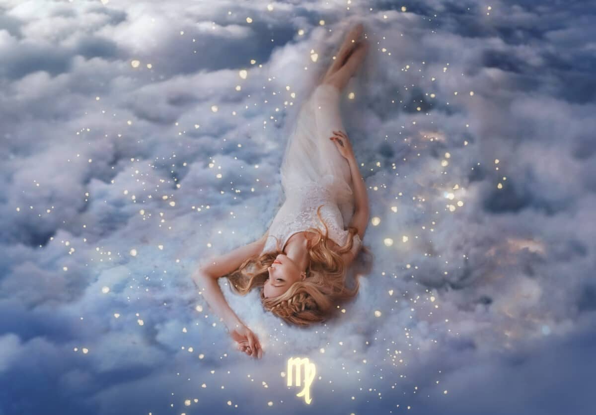 a goddess lies dreaming in the blue sky heaven with shining stars and cosmos in the universe