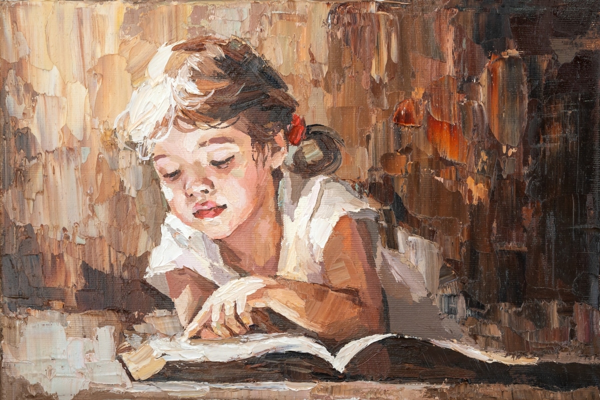 Picture in which a child reads a book in the warm sun.