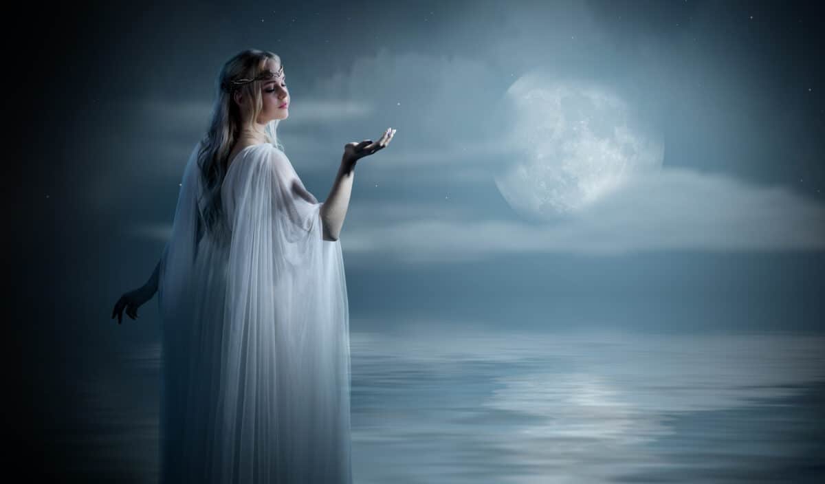 fantasy goddess in the sea with view of the mysterious moon