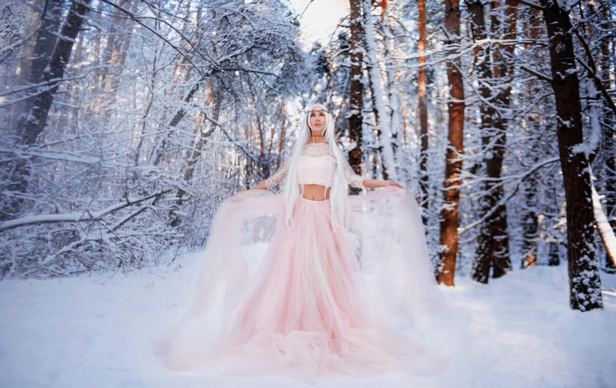 Queen of the elves in a fabulous winter forest