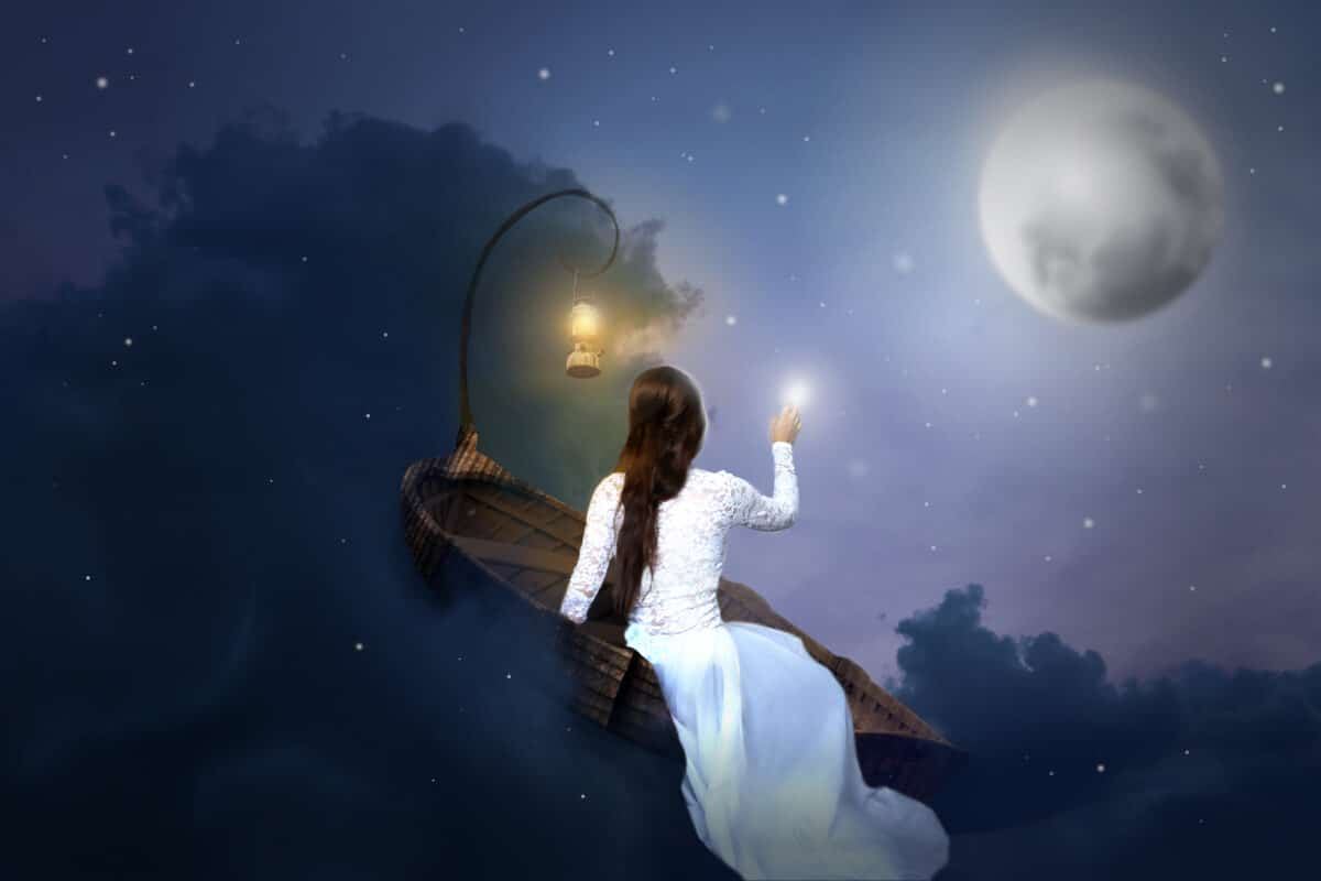 a mysterious lady in white sitting on a boat with light in her hand and the moon at the distance