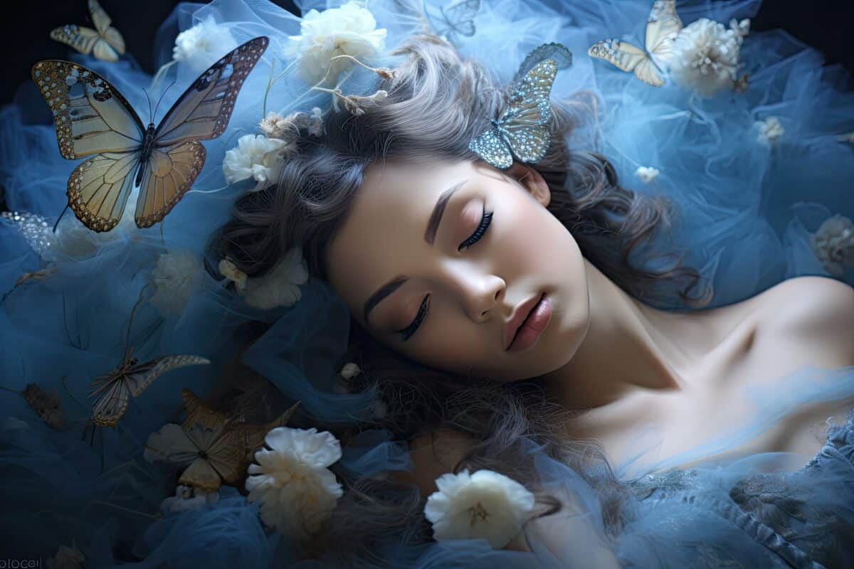 a woman lying on a bed with butterflies on the head