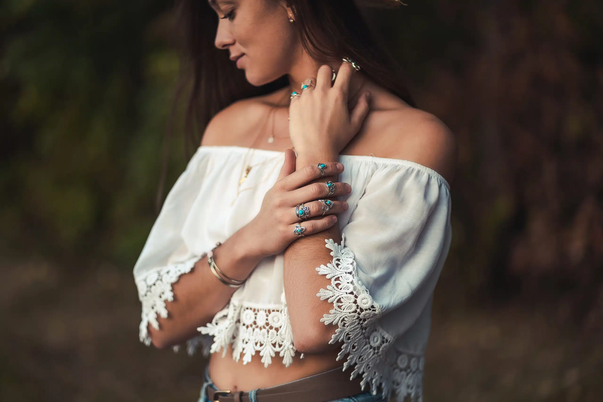 Chic boho woman in a white short blouse.