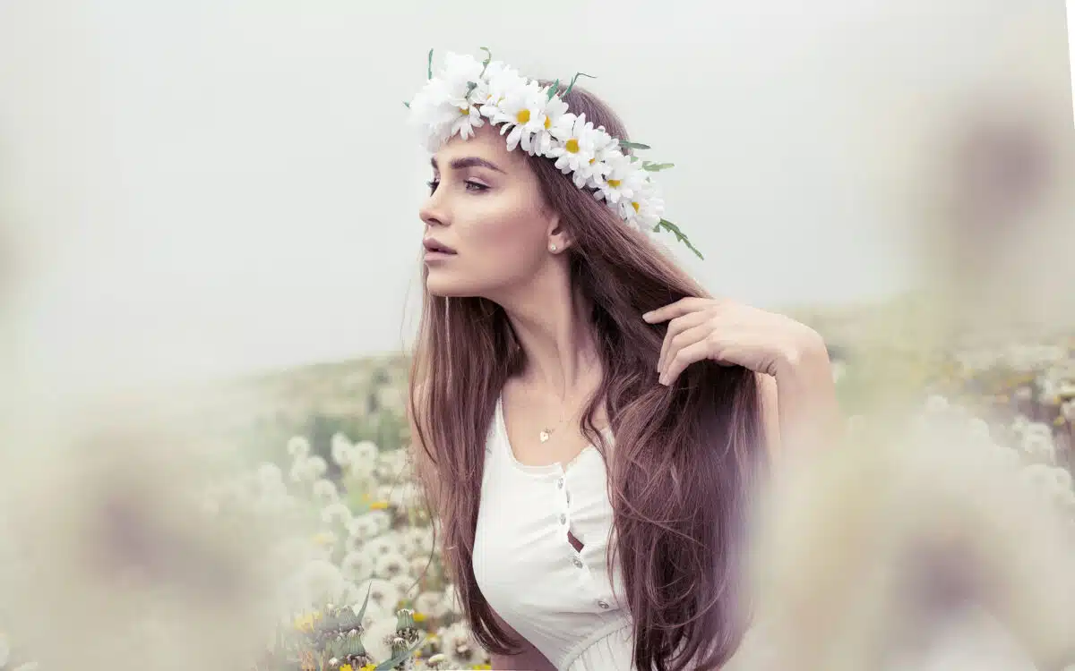 an alluring woman on a meadow