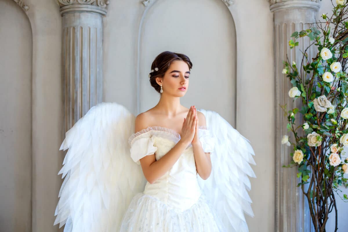 beautiful woman with angel wings inspires beauty