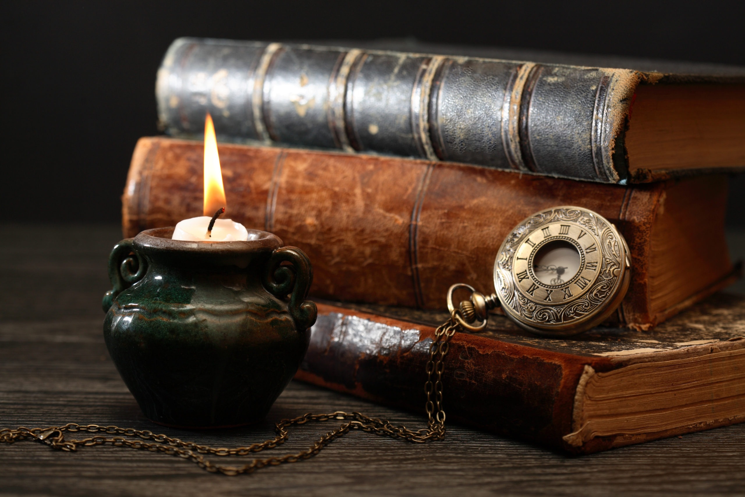 candle and ancient literature books