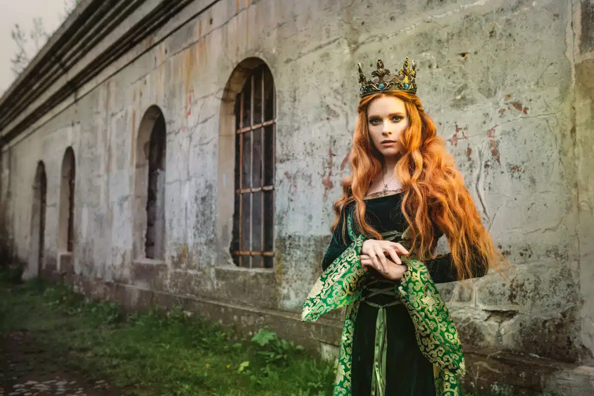 Woman in green medieval dress