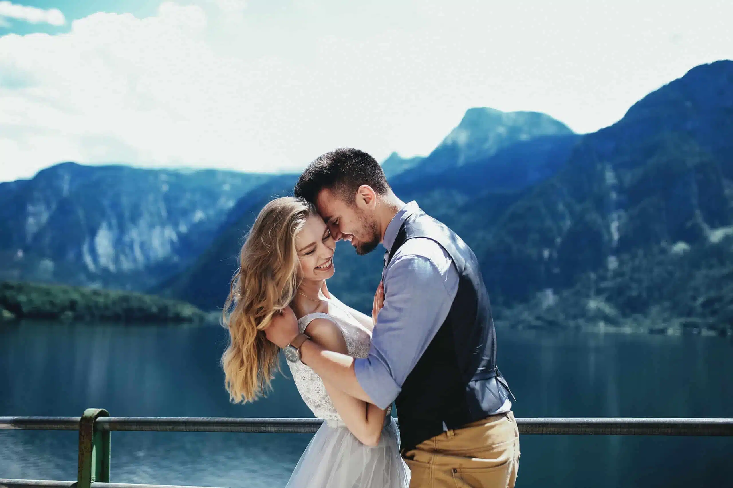 Incredibly beautiful couple in love on the background of the mountains.
