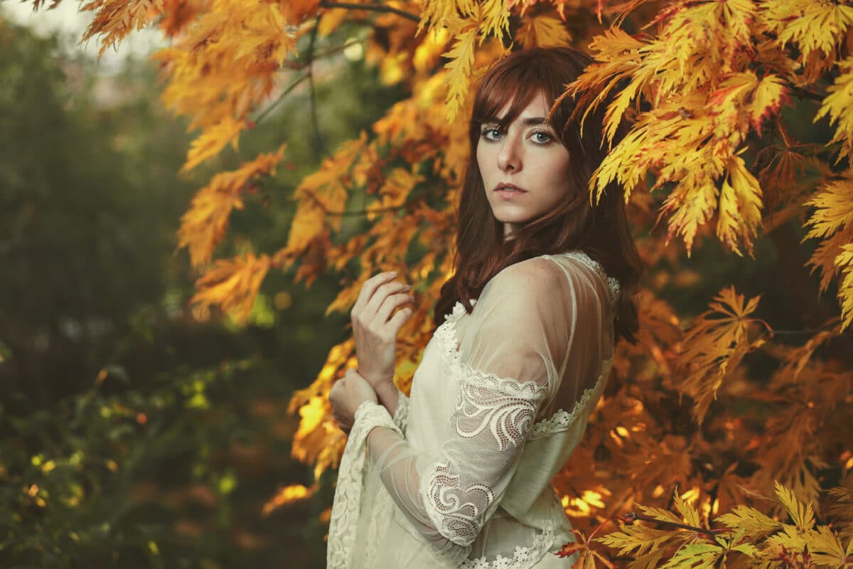 a beautiful maiden in the autumn forest