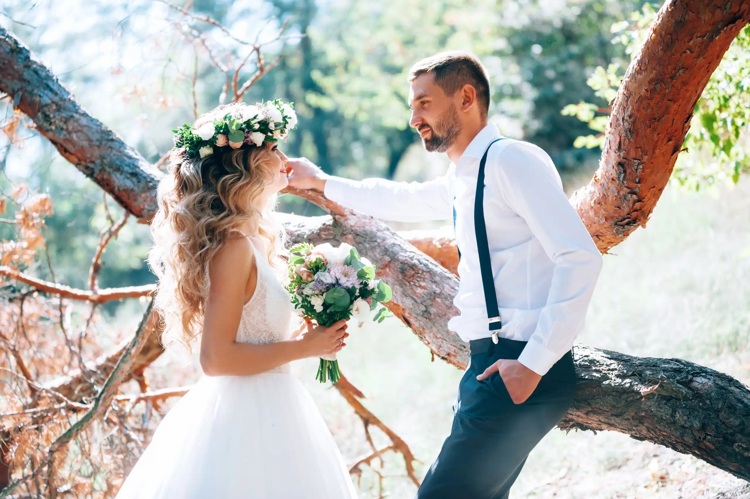 Happy bride and groom on nature, rustic wedding.