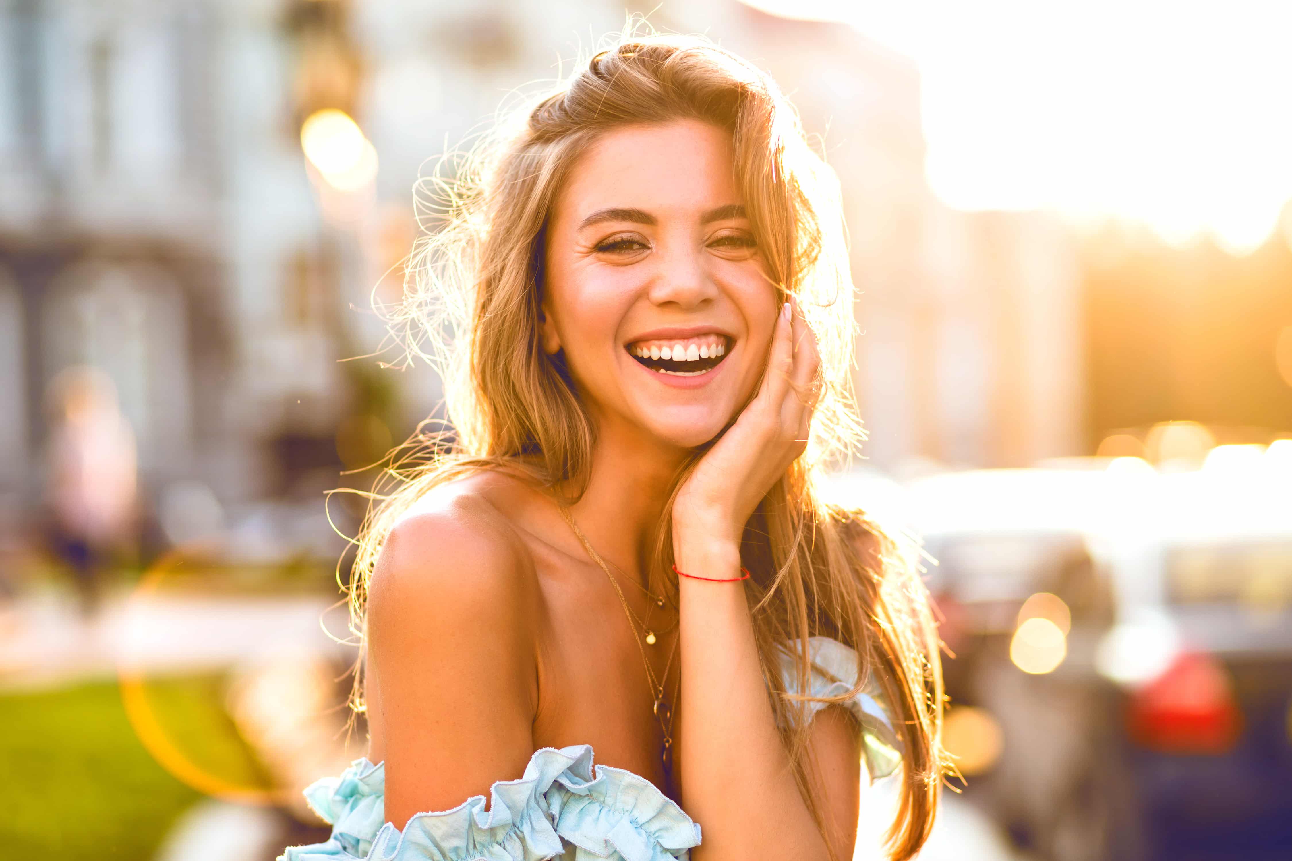 elegant young lady smiling outdoor