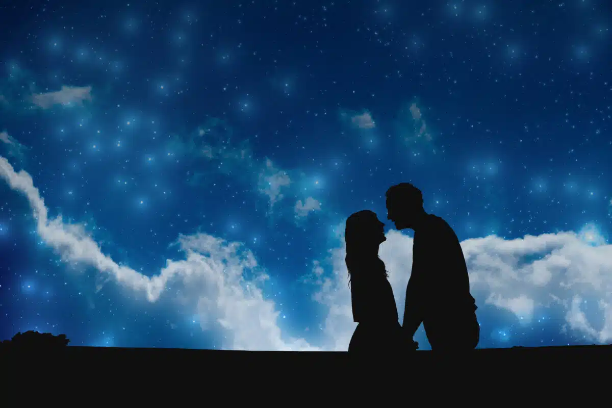 Couple under the Milky way stars