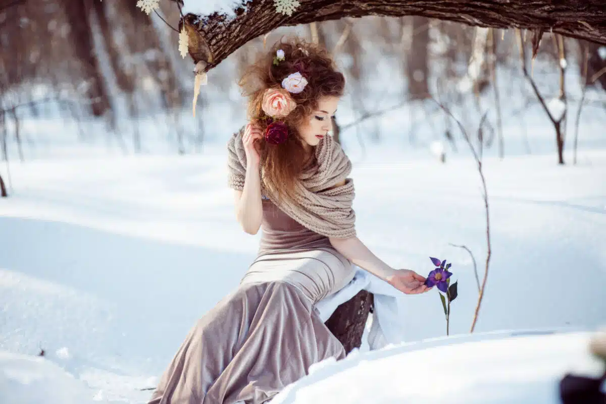 beautiful lady in the winter forest