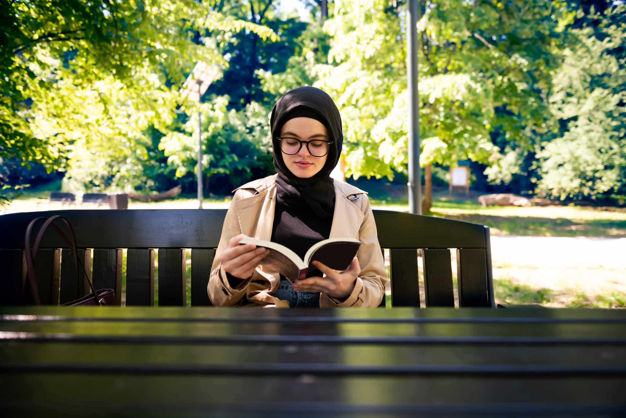 Woman reading a book outdoor