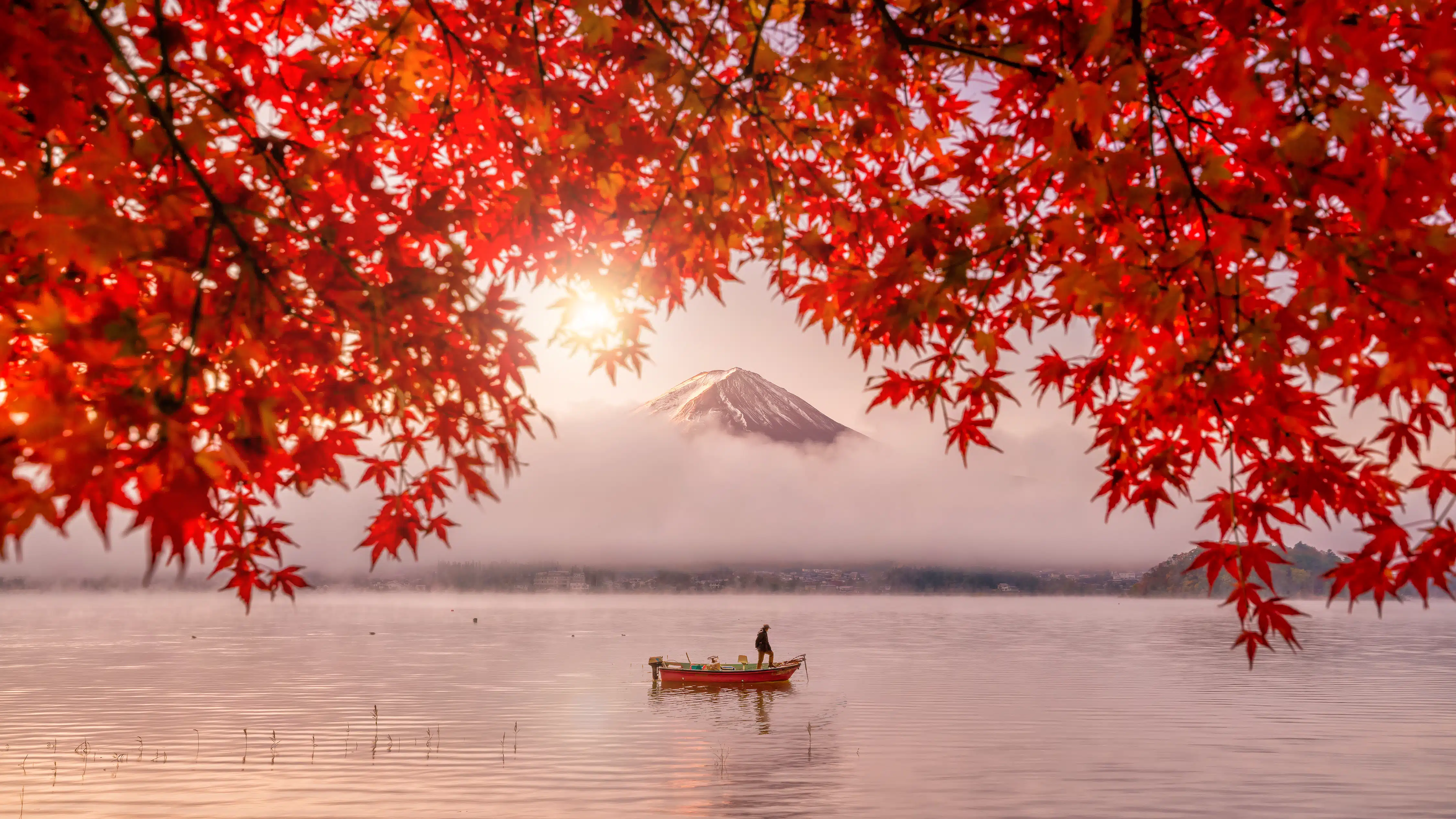 lone boat in the lake near Mount Fuji in autumn