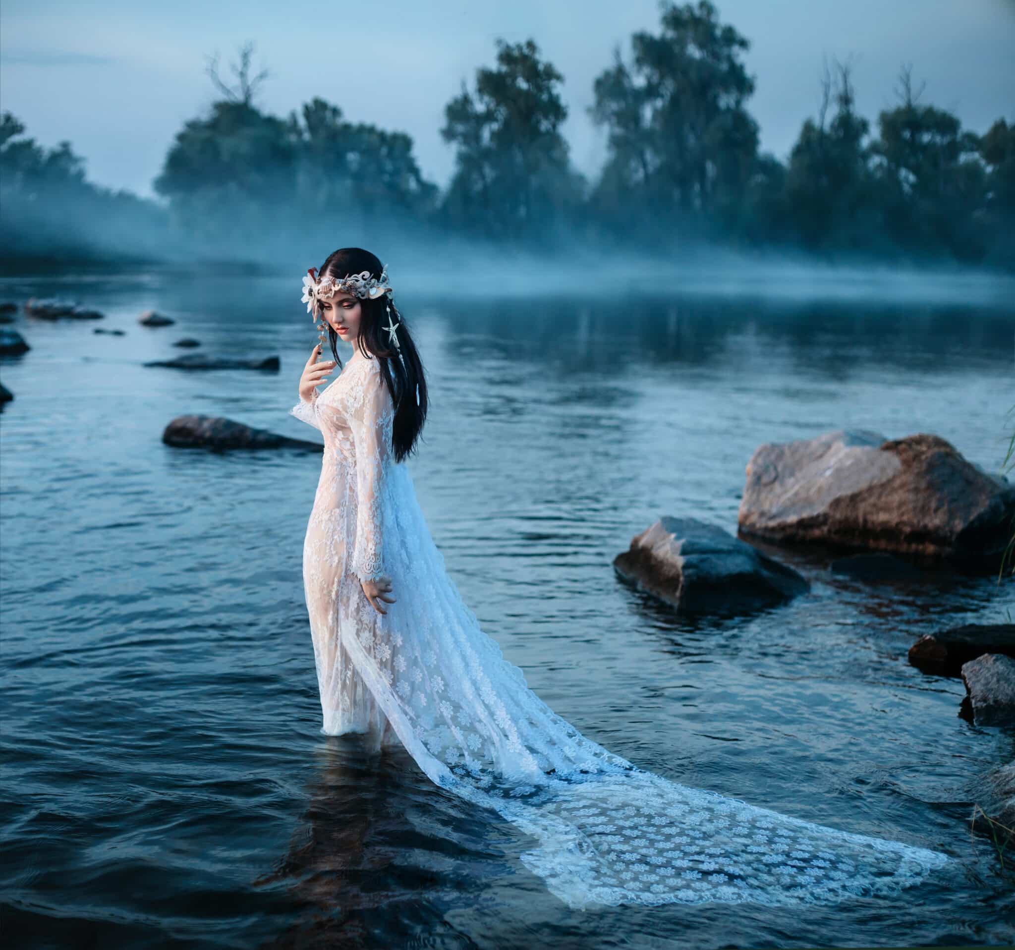 Luxurious lady, in elegant long dress in middle of lake