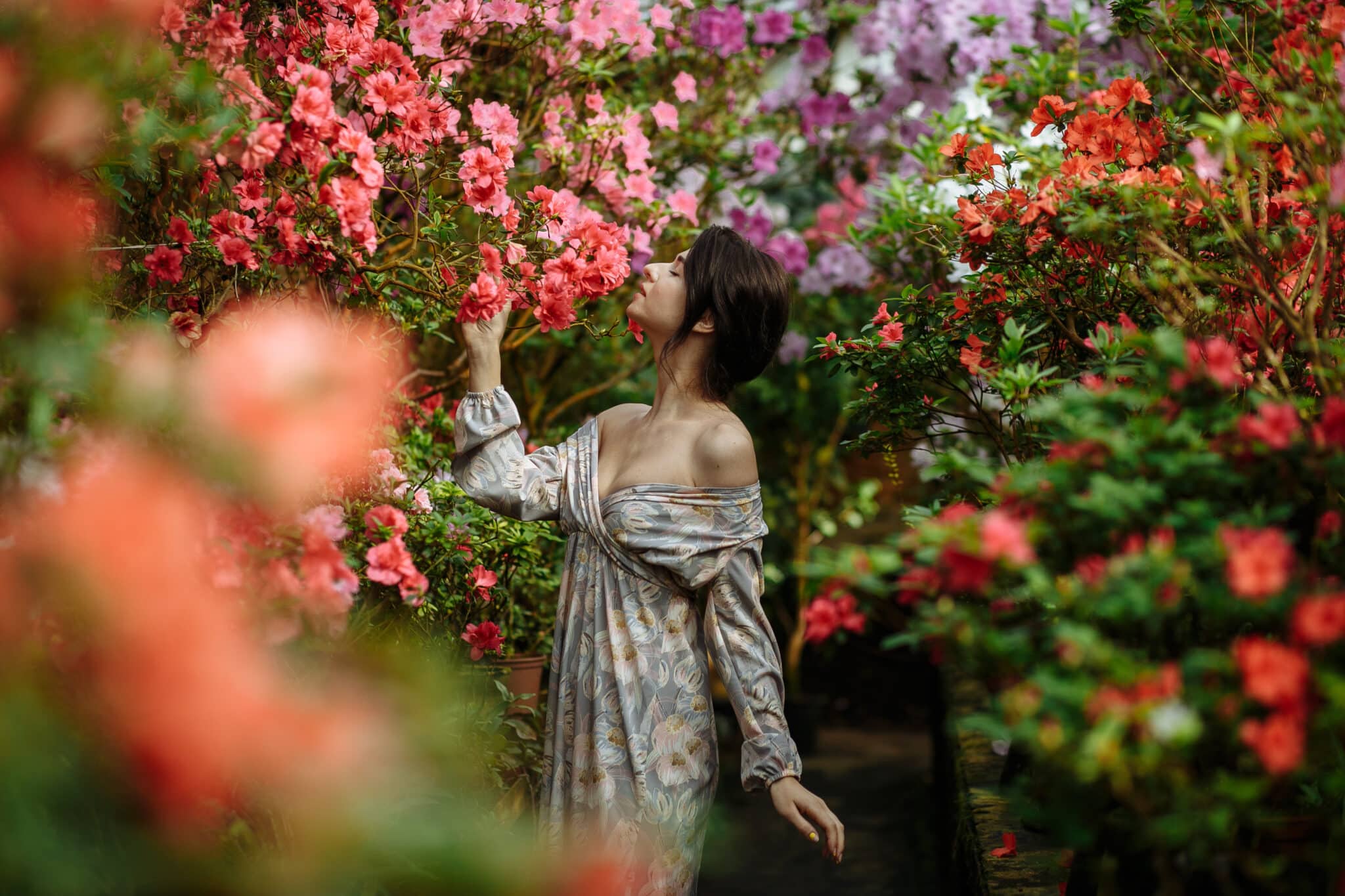 beautiful woman in a garden with lilies