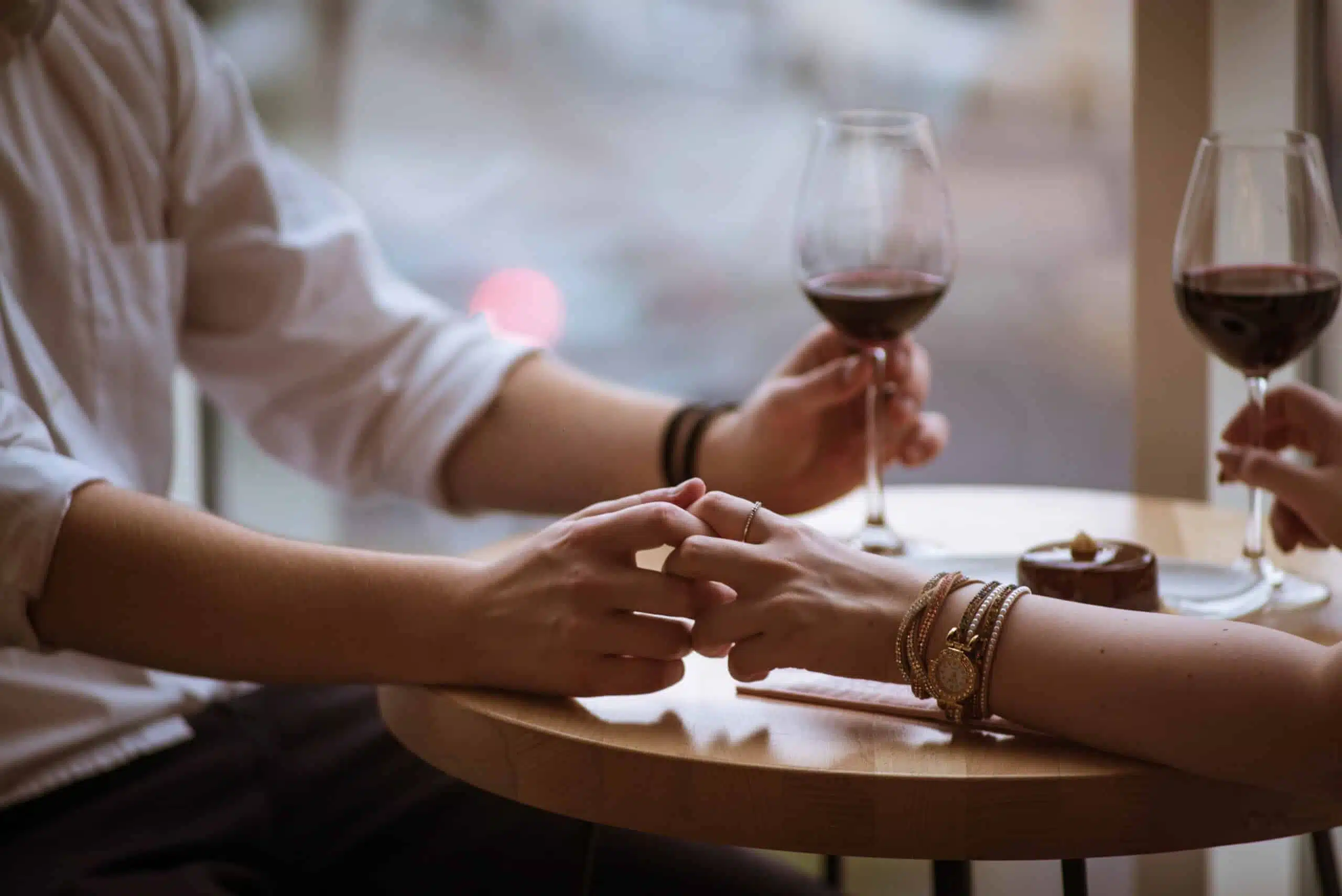 boy and girl hold hands in cafe 4