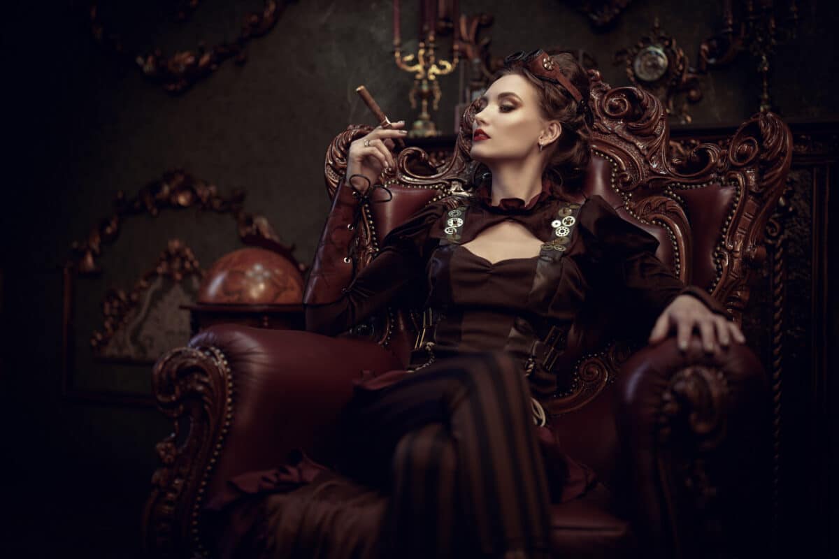 confident and beautiful lady smoking cigar in a vintage room