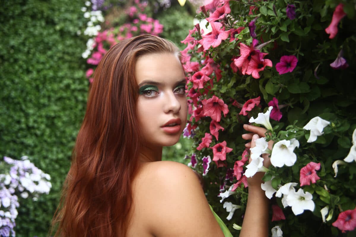 portrait of a young woman in the garden beauty pretty model