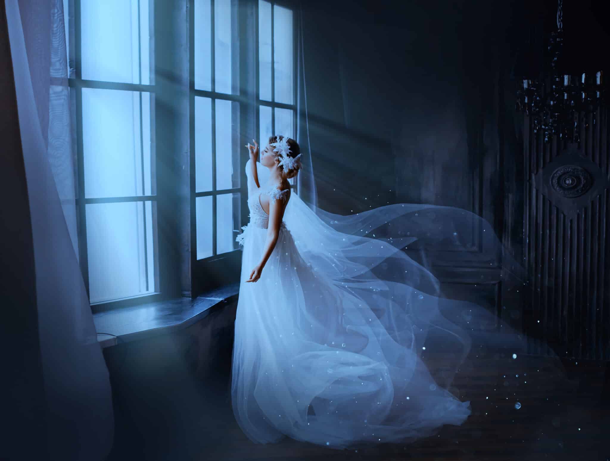 Fantasy gothic woman ghost bride stands by window in black dark room, magic moon light. 