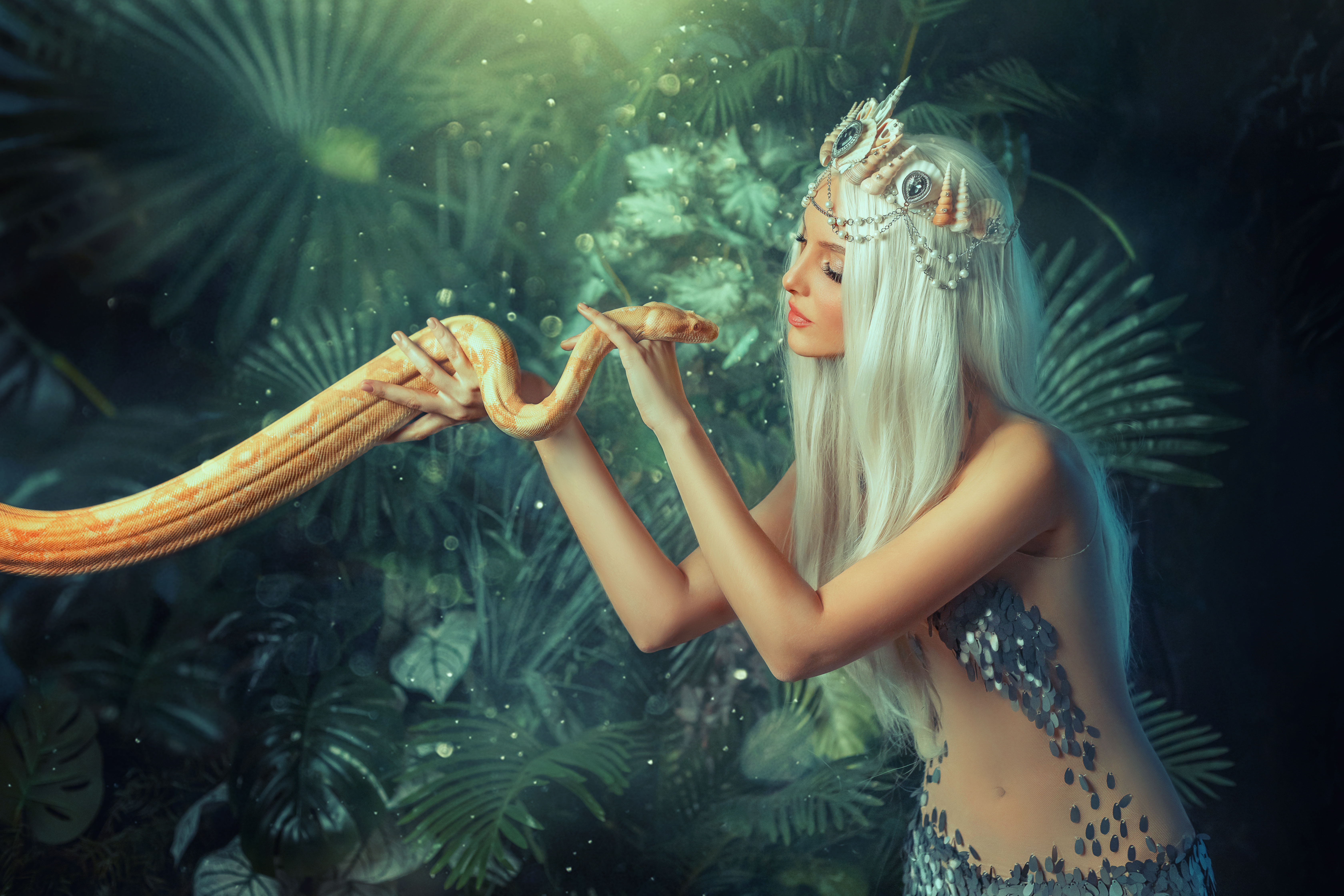 Legend mythical Nagga woman queen sea touch holds milk snake in hands. 