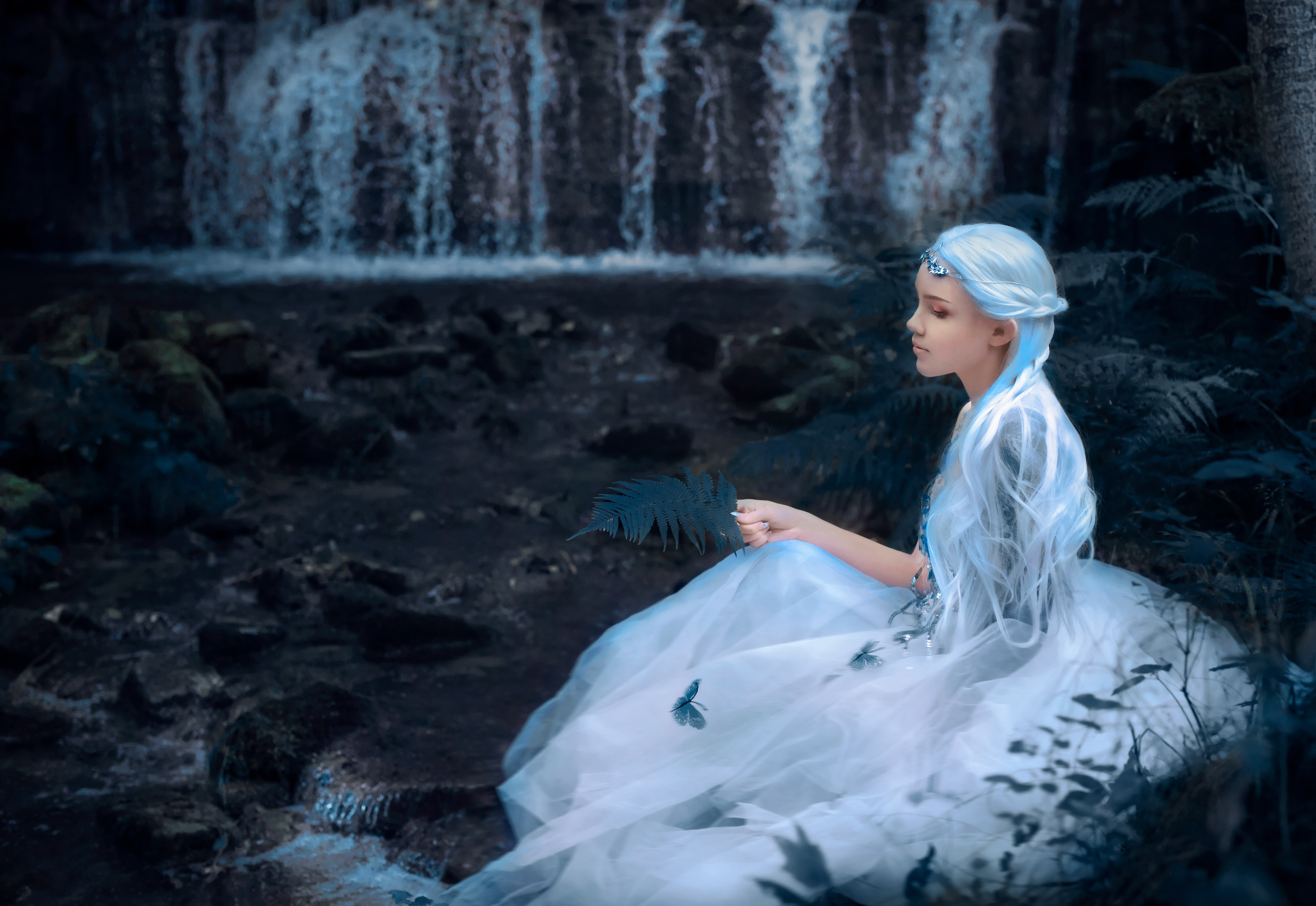 Beautiful portrait of a mysterious ethereal Elf princess sitting