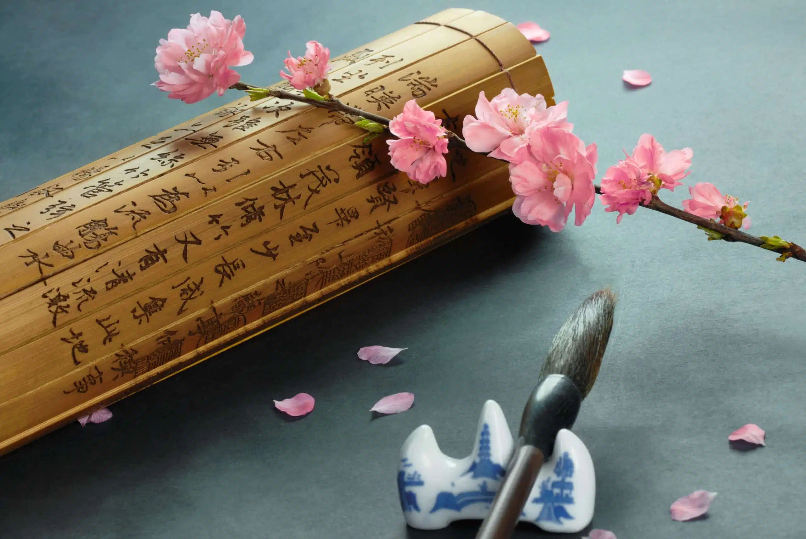 calligraphy set and cherry blossoms