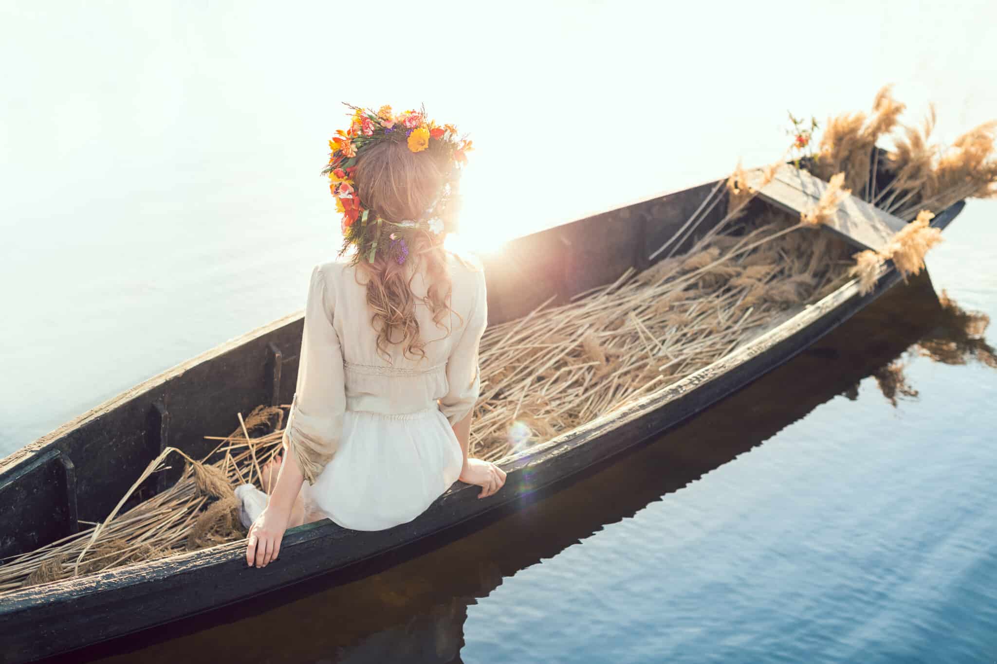 Beautiful girl sitting on a  boat