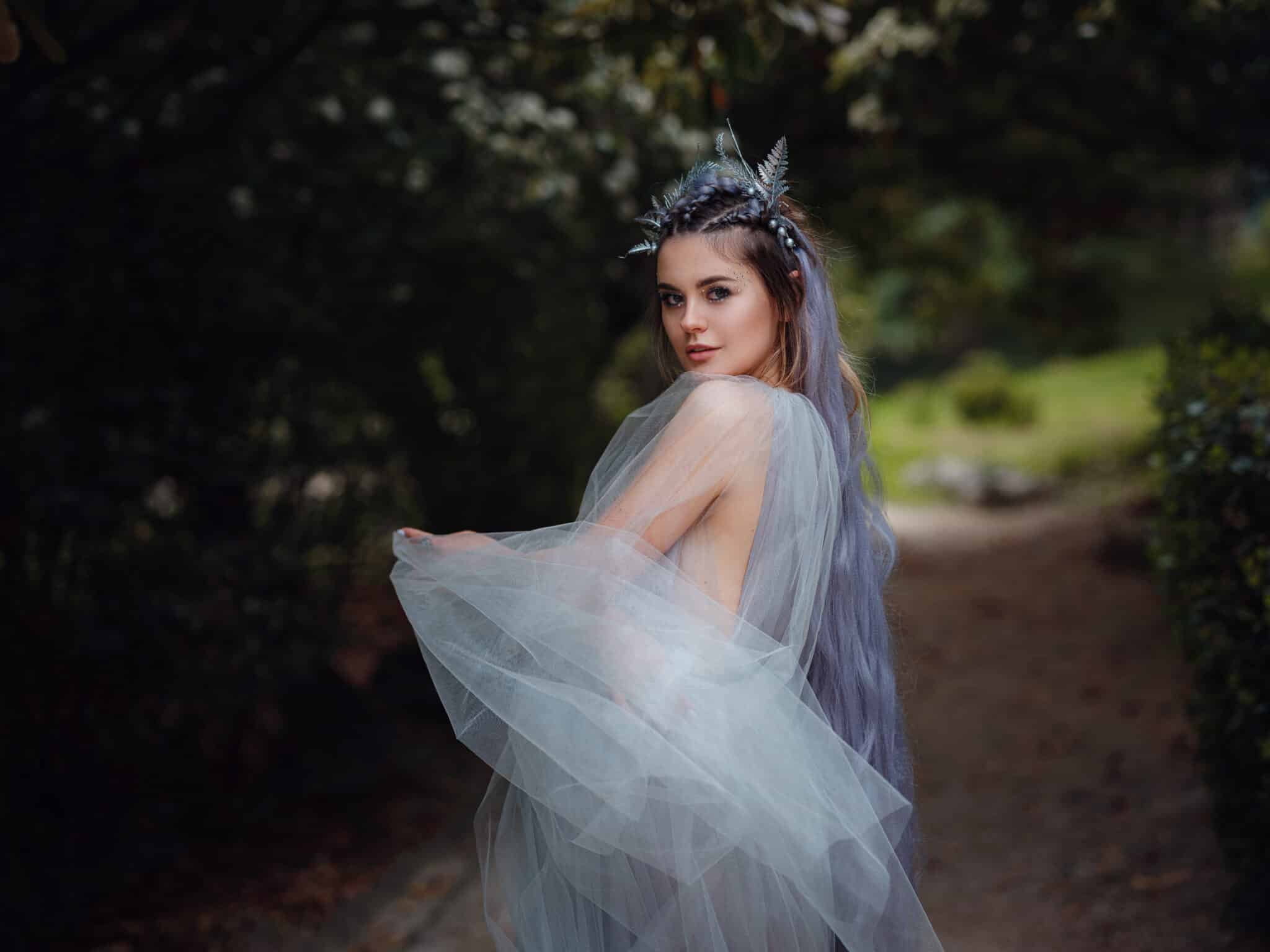 a beautiful princess nymph walking in the woods
