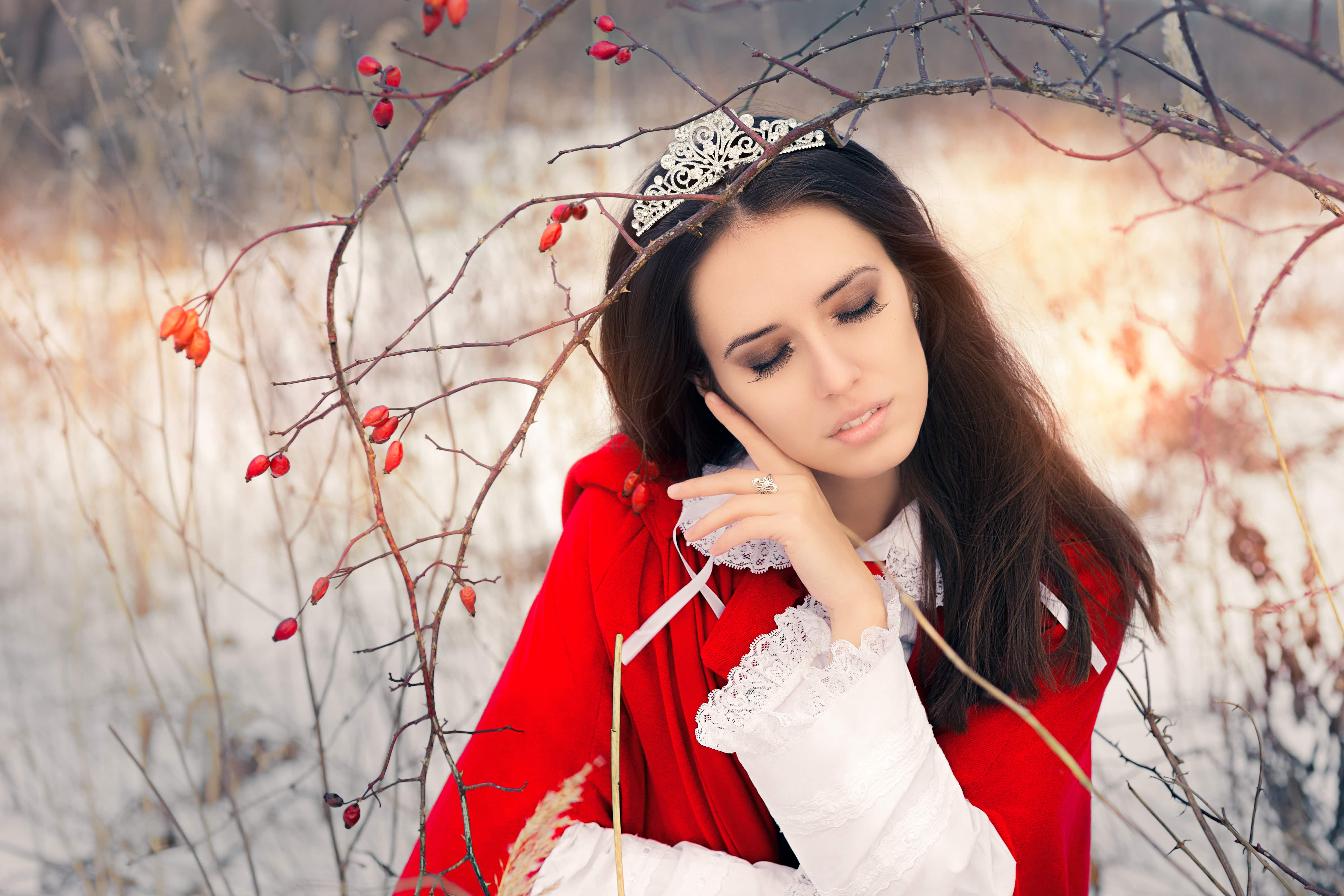 Winter Princess with Rosehip Branch - Portrait of a beautiful fairy tale queen