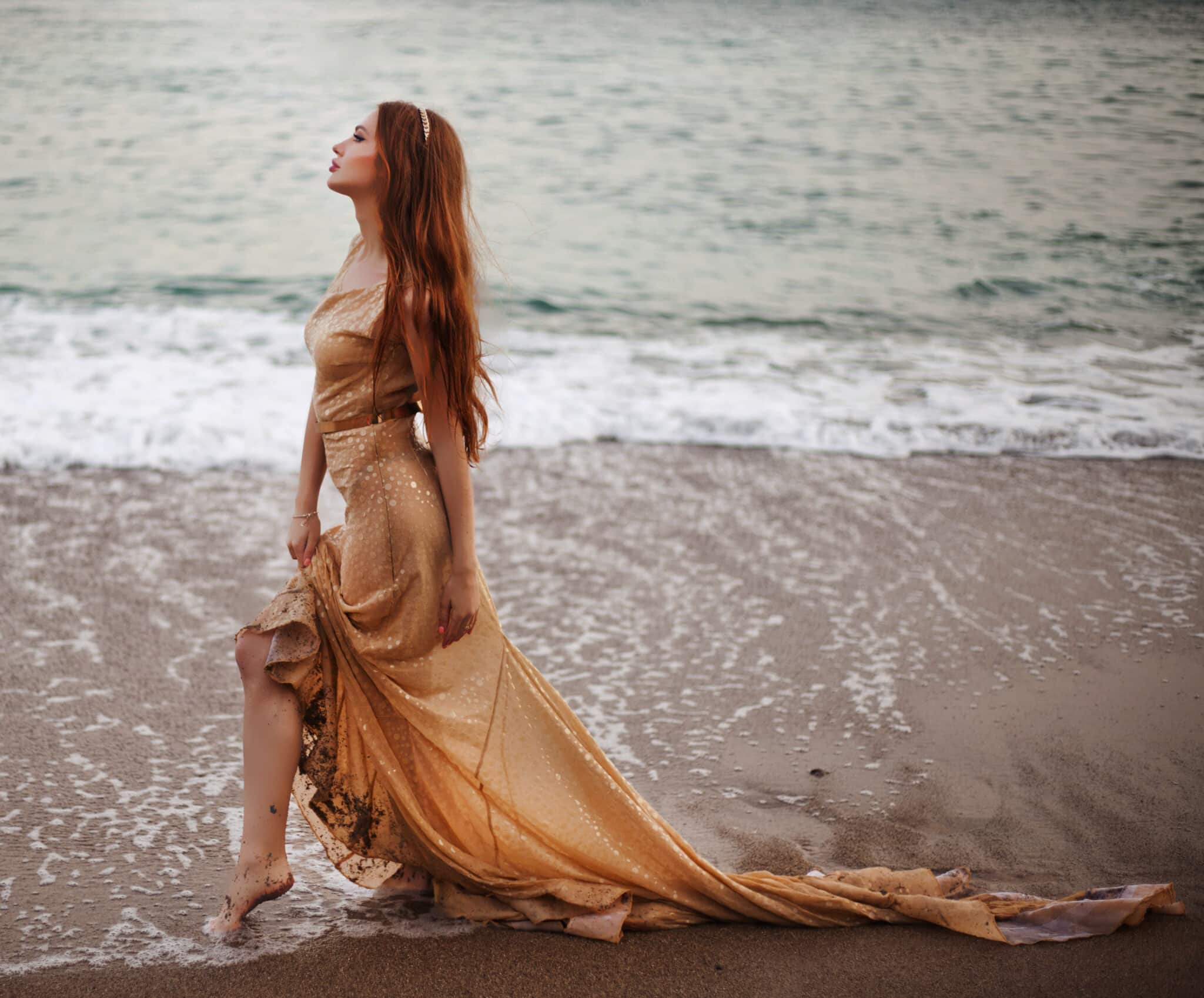 Young beautiful woman fall angel stands on sea beach enjoy nature.