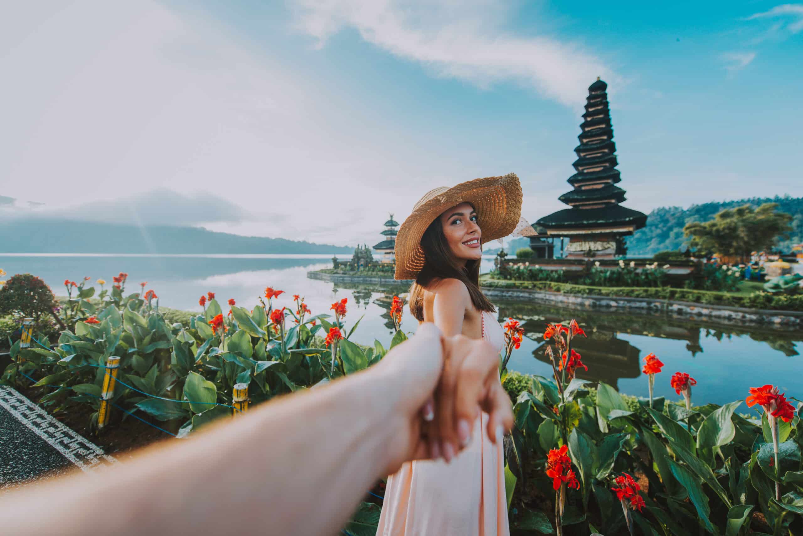 Couple spending time at the ulun datu bratan temple in Bali