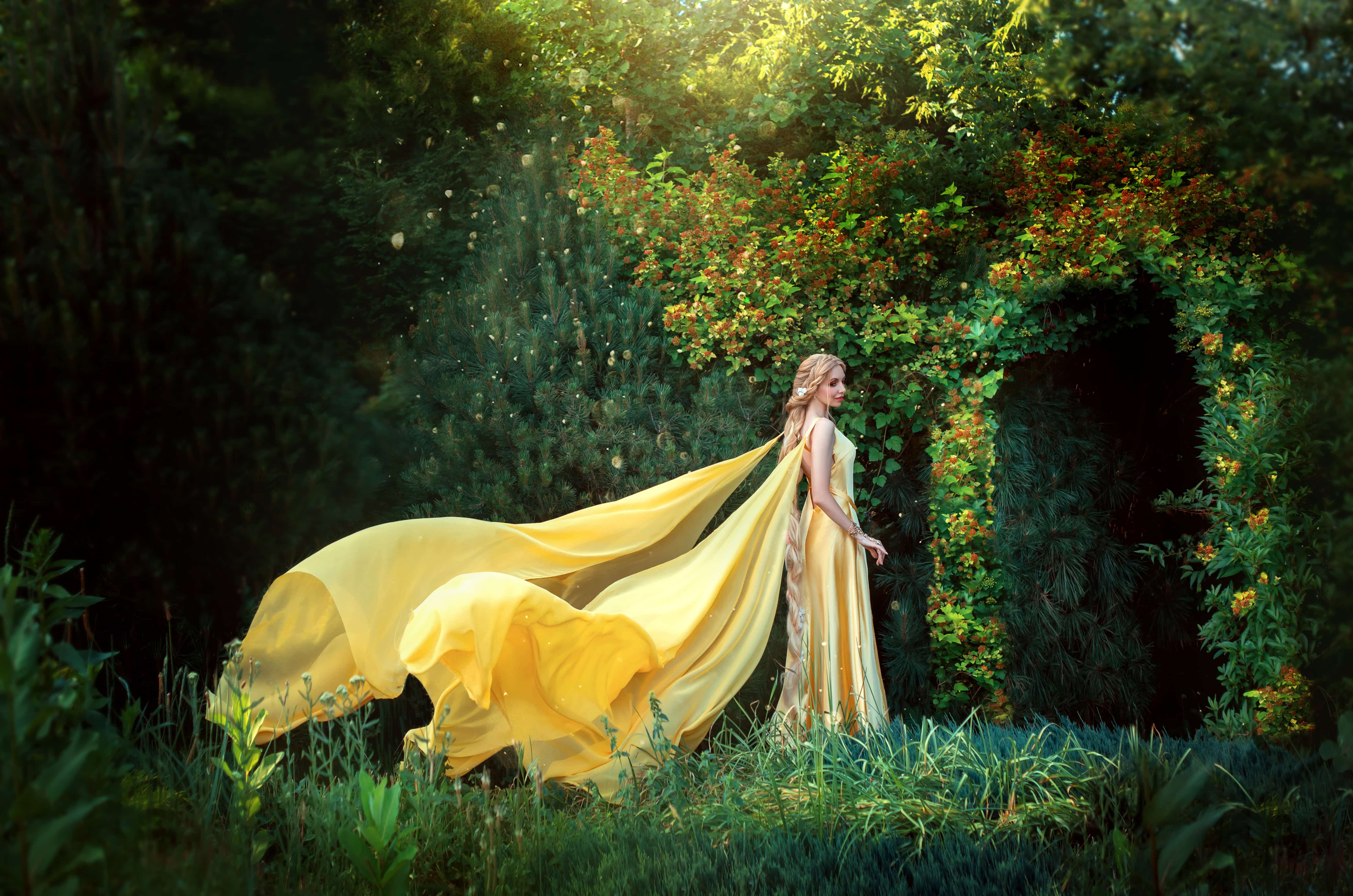 beautiful Russian folk princess is standing in fantasy forest.